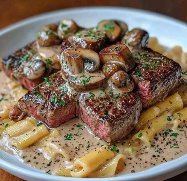 Steak with Mushroom Sauce on Pasta
